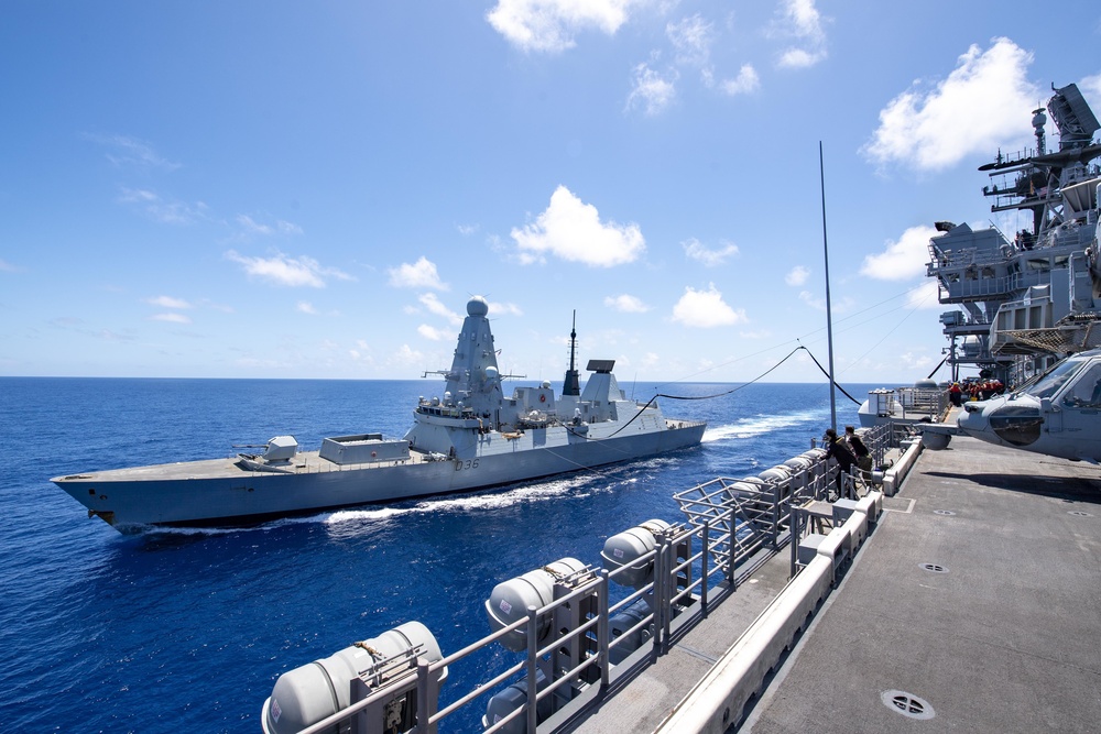 USS America (LHA 6) Conducts a Fueling-At-Sea with Royal Navy Destroyer HMS Defender (D36)