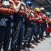 Sailors assigned to the forward deployed amphibious assault ship USS America participate in a fueling-at-sea.
