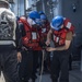 Sailors assigned to the forward deployed amphibious assault ship USS America participate in a fueling-at-sea.