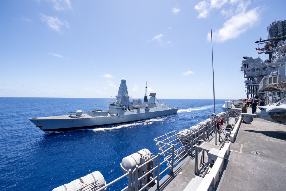 USS America (LHA 6) Conducts a Fueling-At-Sea with Royal Navy Destroyer HMS Defender (D36)