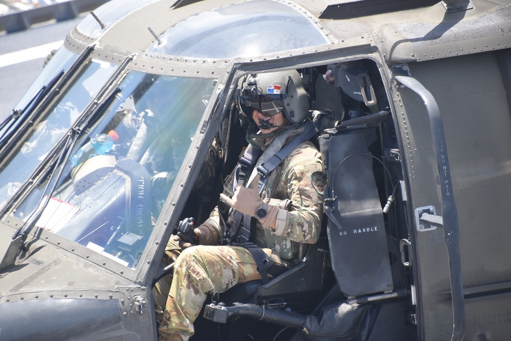 UH-60 Blackhawk Helicopter Pilot Poses for a Picture