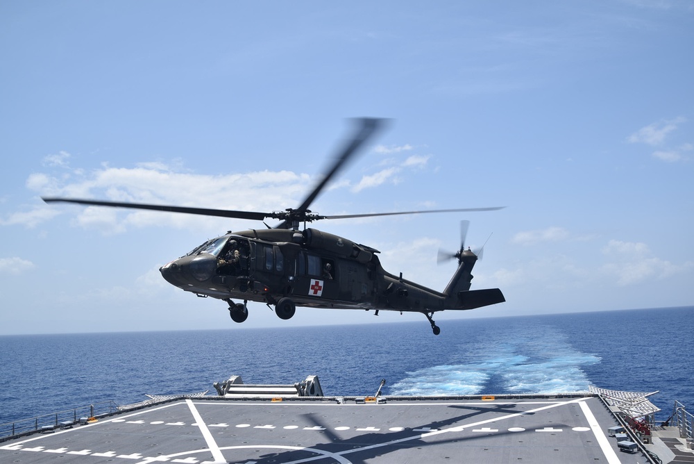 UH-60 Blackhawk Helicopter Takes Off From USNS Burlington