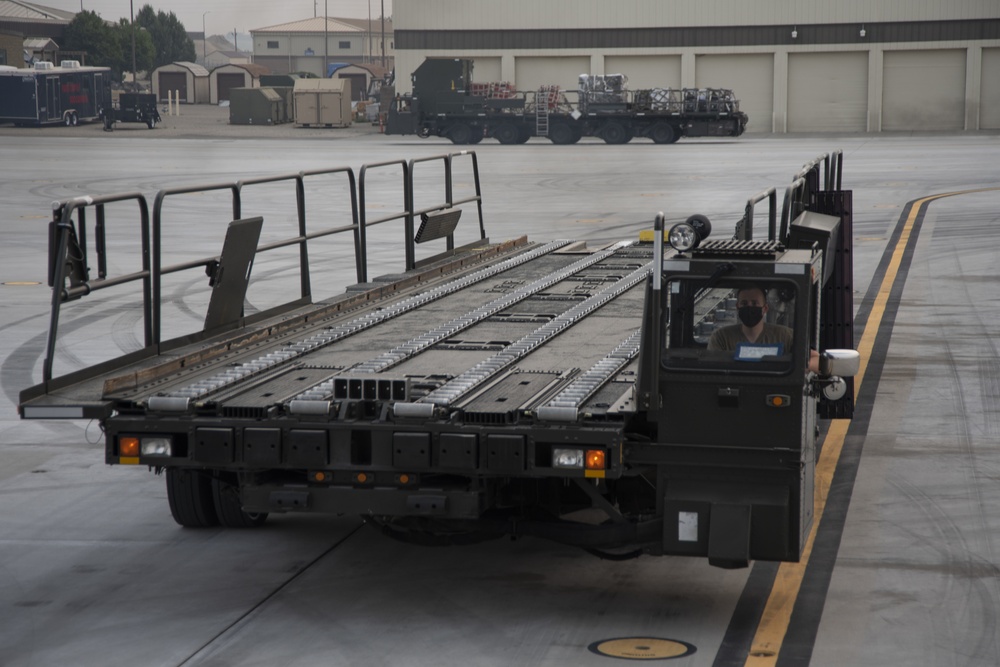 366th LRS and 21st AS offloads cargo from a C-17