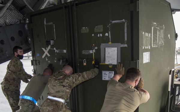 366th LRS and 21st AS offloads cargo from a C-17
