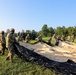 1st Theater Sustainment Commmand Soldiers set up airbeam tent