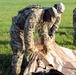 1st Theater Sustainment Commmand Soldiers set up airbeam tent