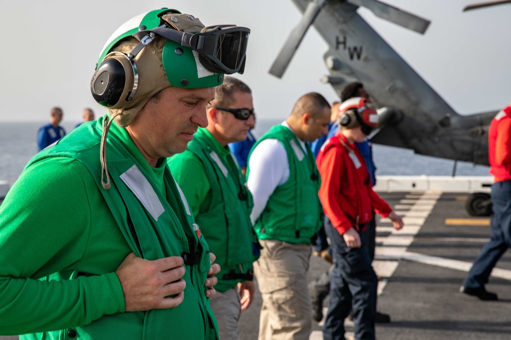 HSC 26 Sailor Participates in a FOD Walkdown Aboard USS Arlington