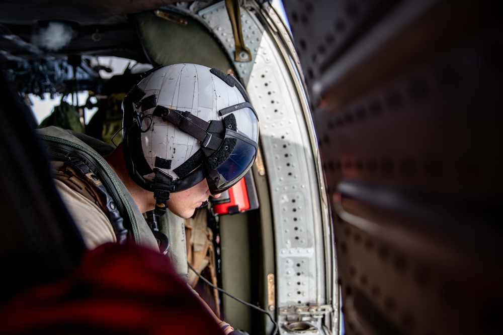 HSC-26 Aircrewman Scans the Caribbean Sea