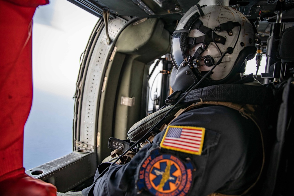 HSC-26 Sailor Flies Over the Caribbean Sea