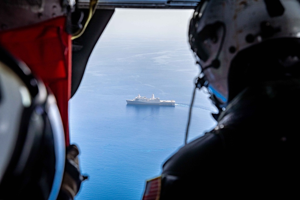 HSC 26 Sailor Flies Over USS Arlington