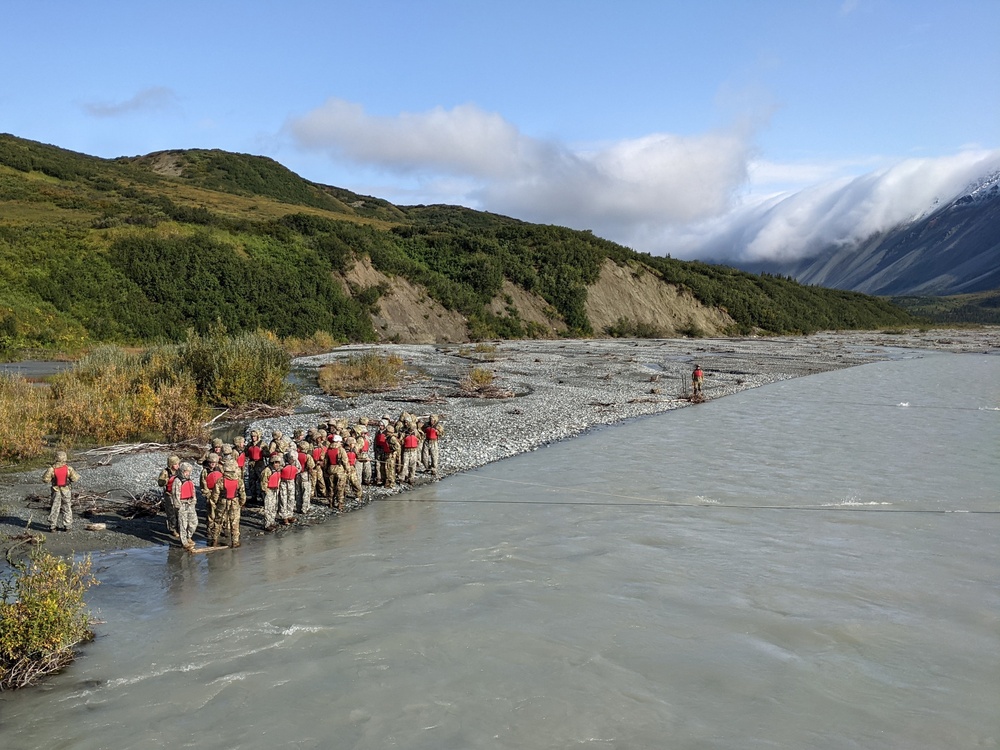 Students at Black Rapids conduct river crossing on foot