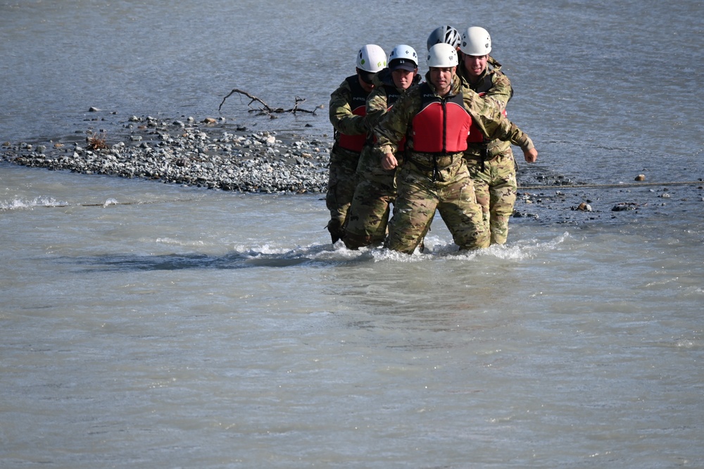 Students at Black Rapids conduct river crossing on foot