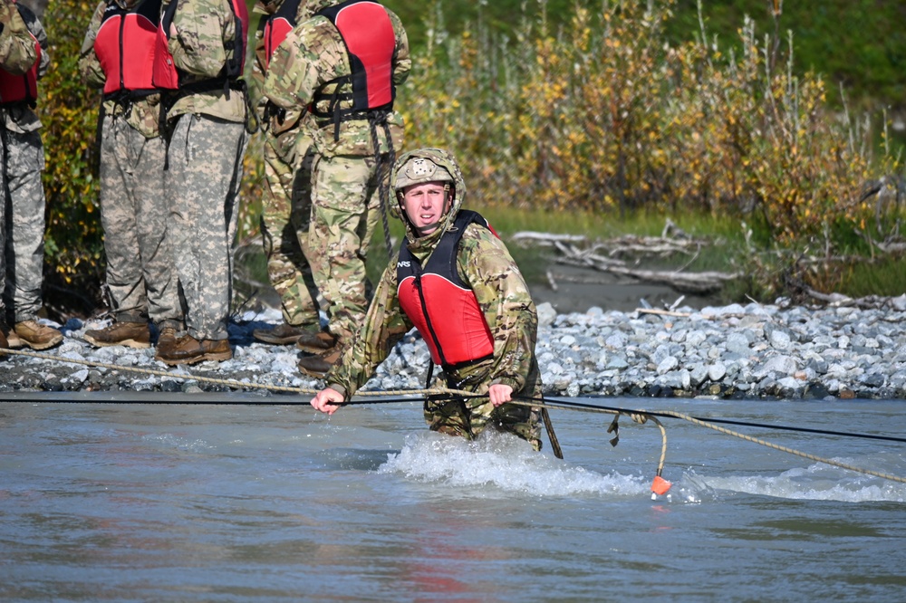 Students at Black Rapids conduct river crossing on foot