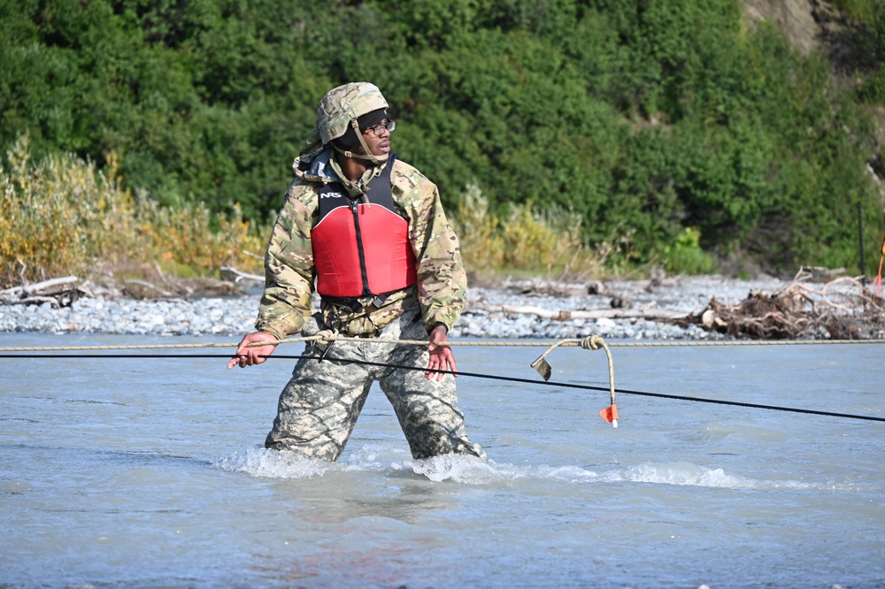 Students at Black Rapids conduct river crossing on foot