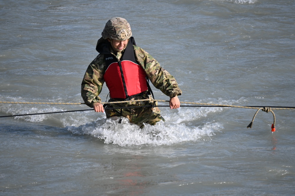 Students at Black Rapids conduct river crossing on foot