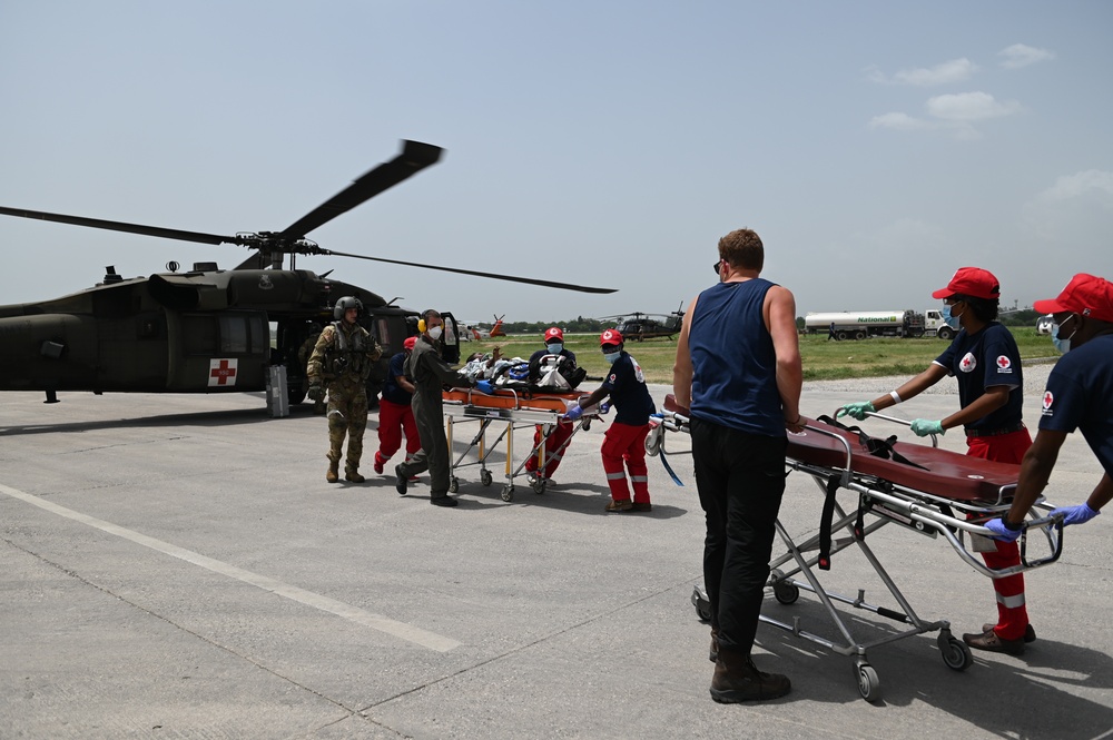 Coast Guard assists army in Medevac in Port-au-Prince, Haiti