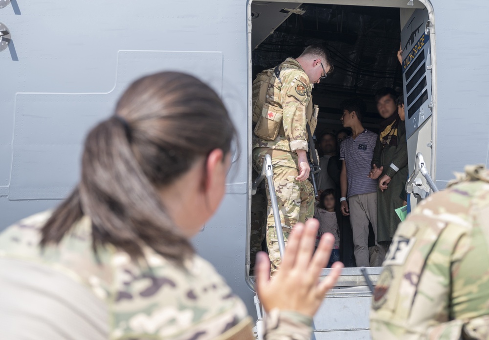 Evacuees arrive at Ali Al Salem Air Base