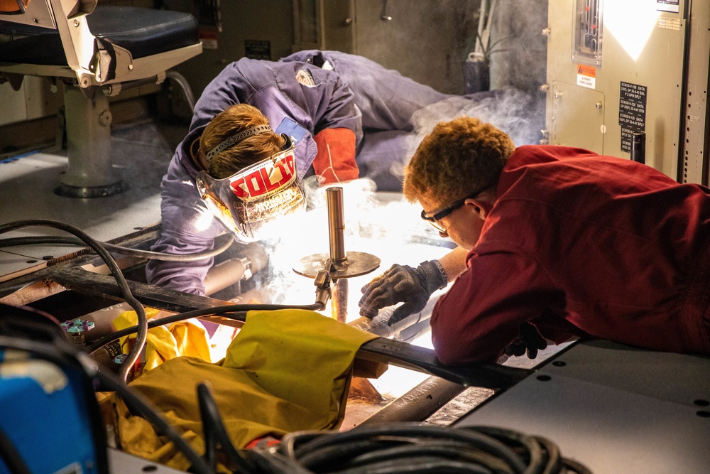 Sailors Conduct Repairs