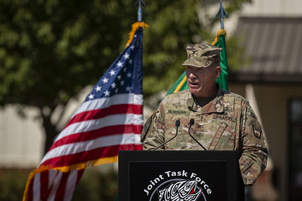 Joint Task Force Steelhead addresses audience during deactivation ceremony