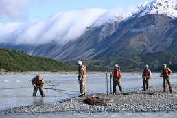 Students at Black Rapids conduct river crossing on foot