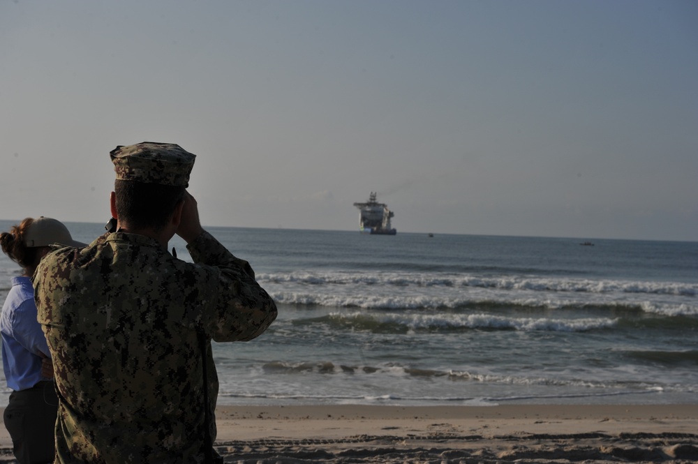 Lt. Cmdr. Austin Rasbach monitors the progress of the Distributed Littoral Operations Fuel Transfer System (DLOFTS) during Large Scale Exercise (LSE) 2021.