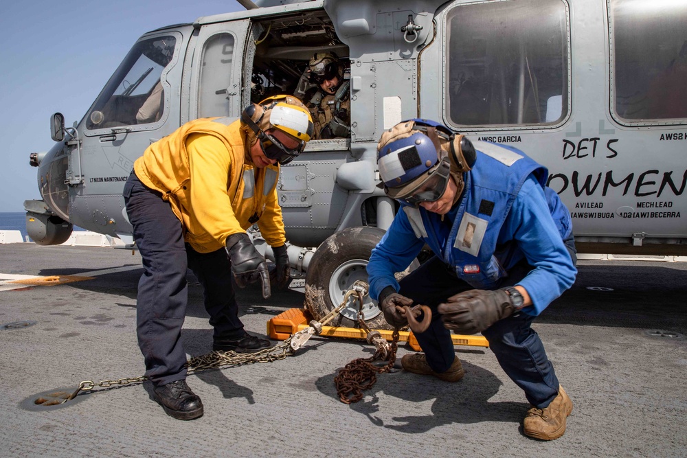 Sailors and Marines Work Together During Flight Operations Aboard USS Arlington