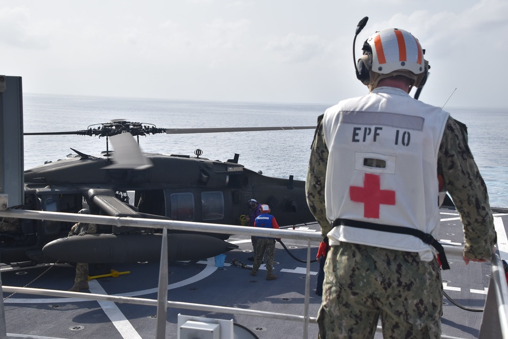 USNS Burlington Sailor Stands Ready to Assist in Case of Emergency During Refueling