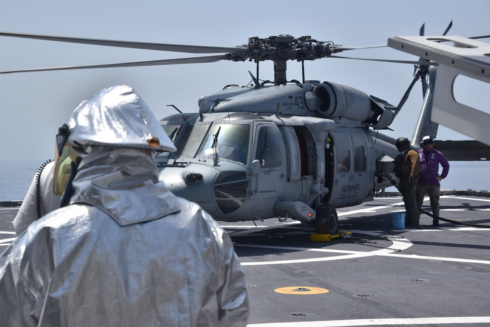 USNS Burlington Sailor Stands By During Refueling