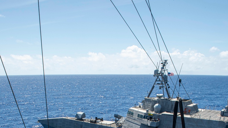 USS America fuels USS Charleston at sea