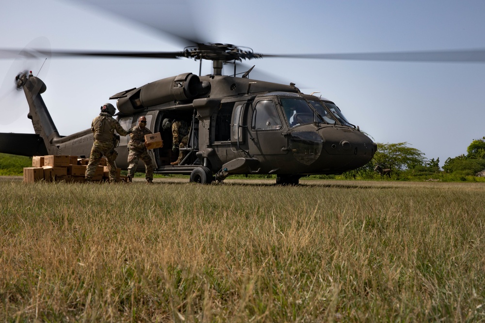 Guardsmen from the Puerto Rico Army National Guard Aviation continue assisting in aid-relief efforts