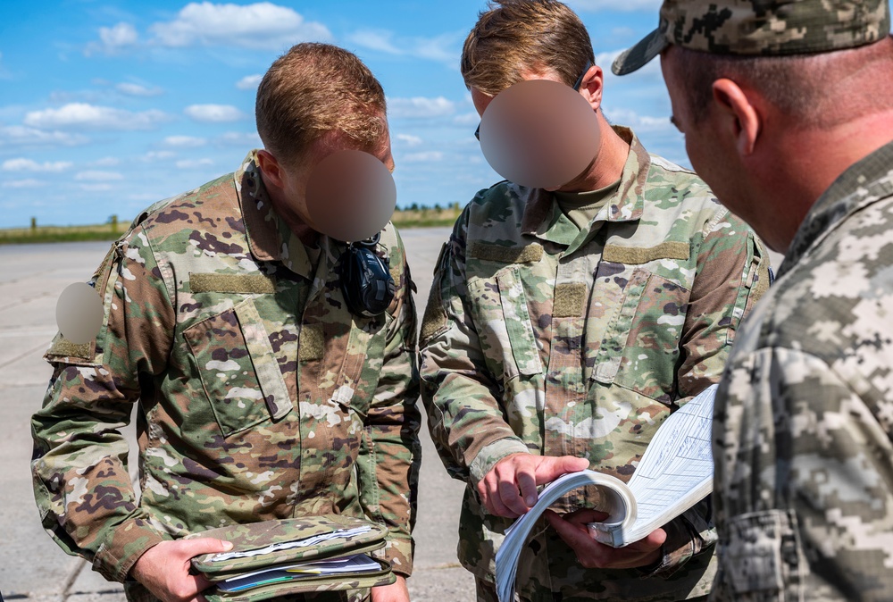 352d Special Operations Forces and Ukrainian Air Force Members Exchange Maintenance Procedures