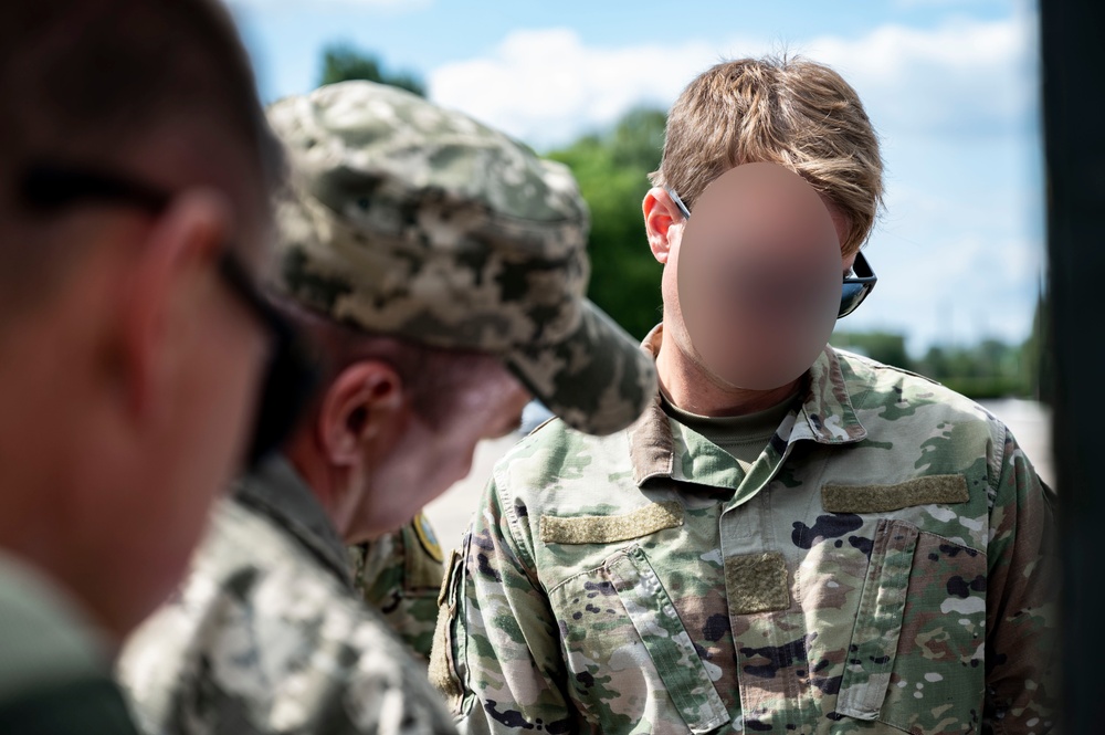 352d Special Operations Forces and Ukrainian Air Force Members Exchange Maintenance Procedures