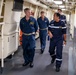 U.S. and French Navy Captains Converse While Touring USS Arlington