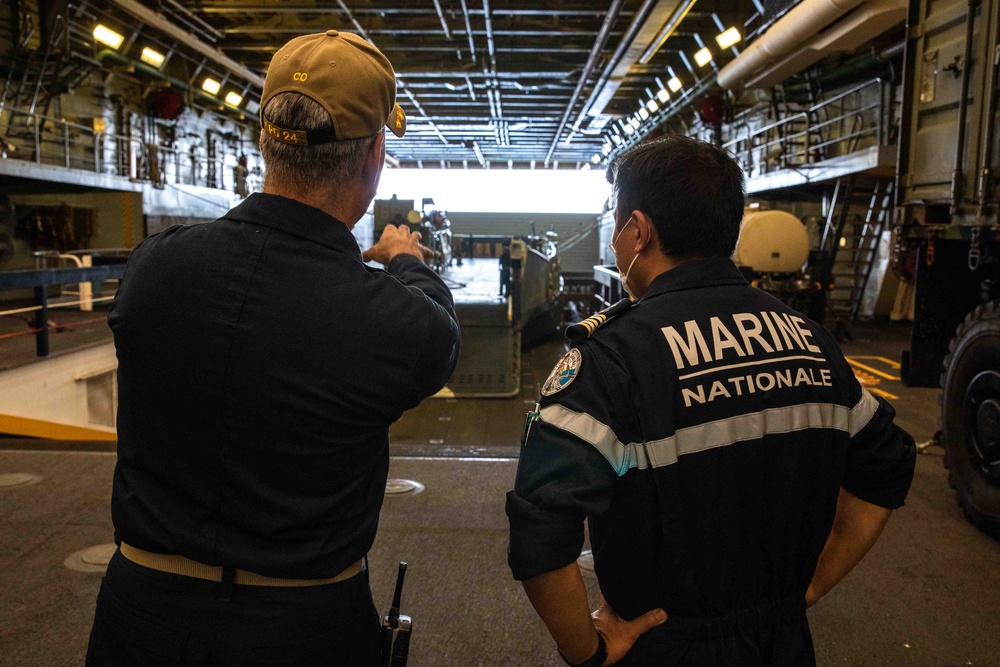 French Navy Captain Tours USS Arlington