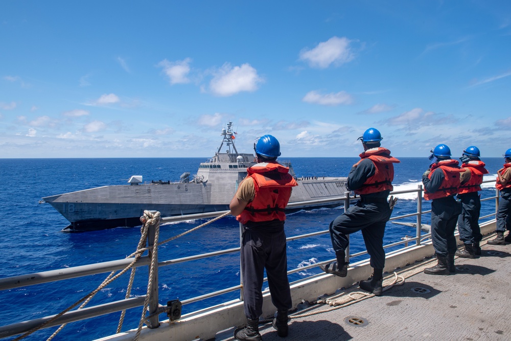 USS America conducts a fueling-at-sea with USS Charleston