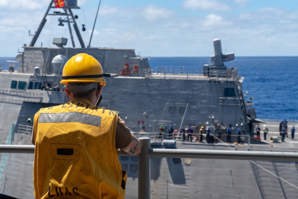 USS America conducts a fueling-at-sea with USS Charleston