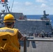 USS America conducts a fueling-at-sea with USS Charleston