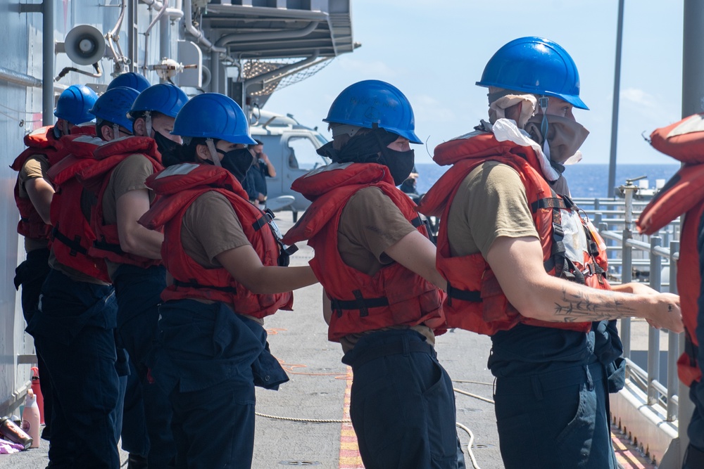 USS America conducts a fueling-at-sea with USS Charleston