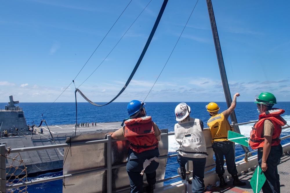 USS America conducts a fueling-at-sea with USS Charleston