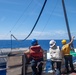 USS America conducts a fueling-at-sea with USS Charleston