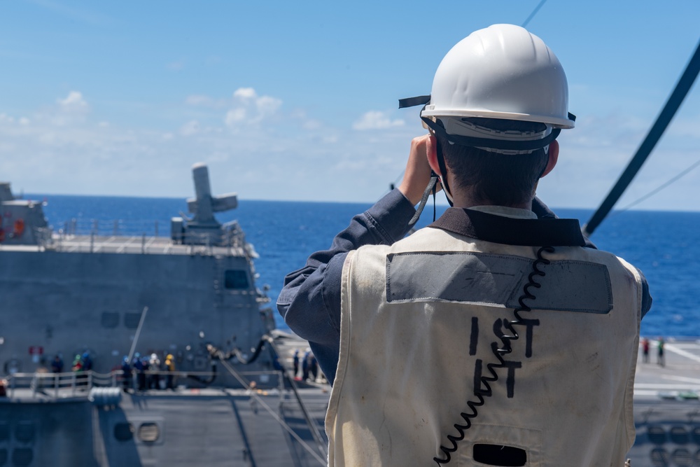 USS America conducts a fueling-at-sea with USS Charleston