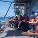 USS America conducts a fueling-at-sea with USS Charleston