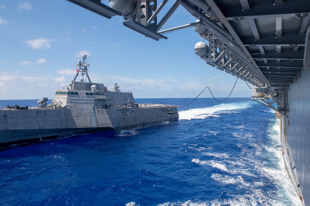 USS America conducts a fueling-at-sea with USS Charleston