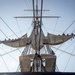 Sailors furl sail aboard USS Constitution