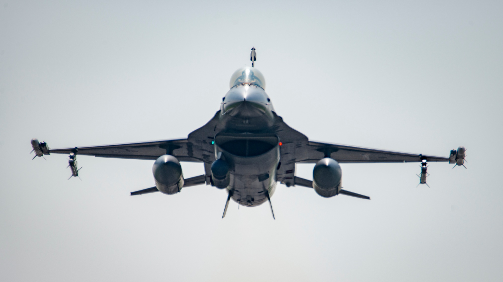 Three U.S. Air Force F-16C Fighting Falcons, from the New Jersey Air  National Guard's 177th Fighter Wing, fly in formation over the Atlantic  City boardwalk during the 2019 AC Airshow, A Salute