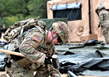 Soldiers build field hospital while training in CSTX, Global Medic at Fort McCoy