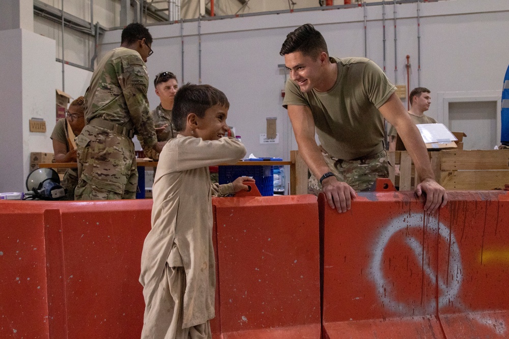 Service Members provide support during evacuation