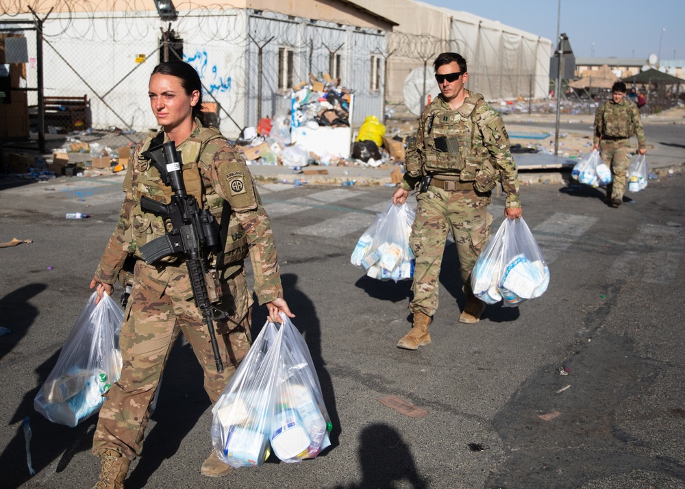 Soldiers Move Packaged Care Bags to Deliver to Evacuating Families