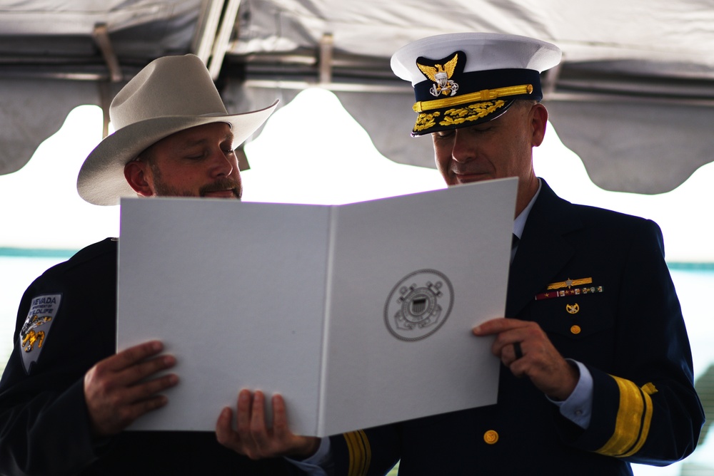 Silver Lifesaving Medal awarded to Nevada game warden who saved girl from drowning