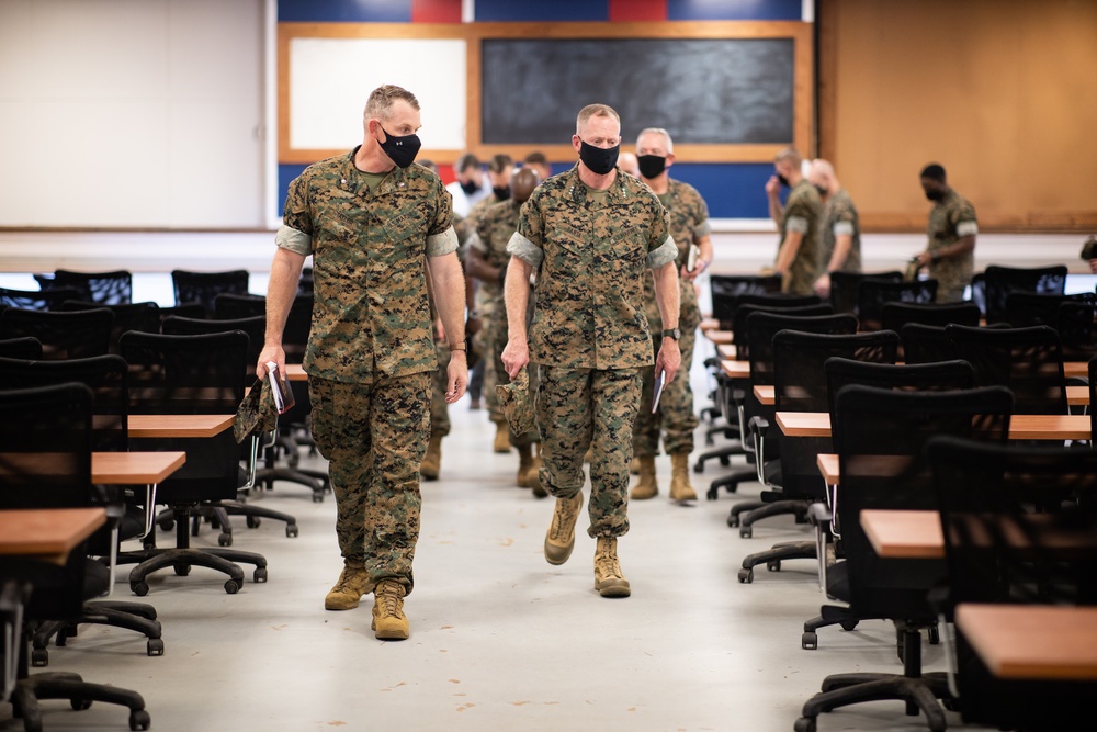 Marines prepare for the arrival of Afghans at Quantico